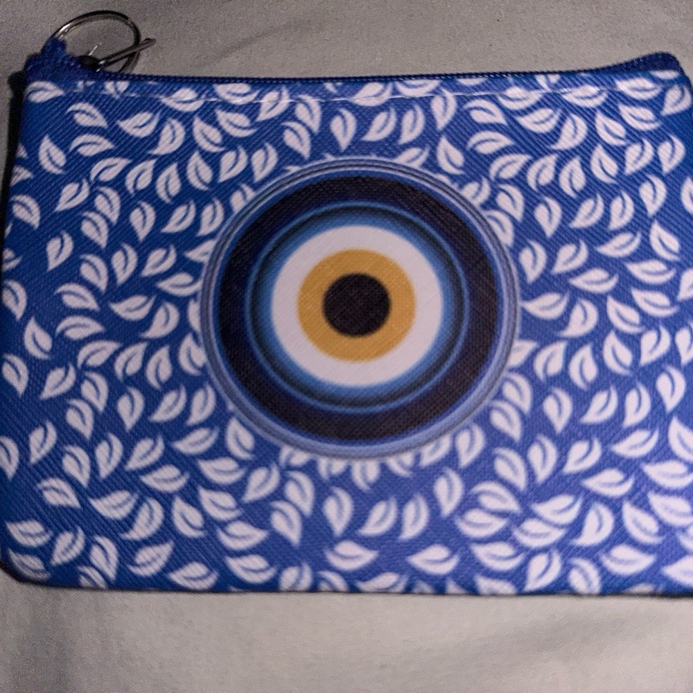 Blue Pouch with Eye and Leaf Design